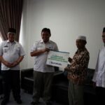 Bupati Saksikan Penyerahan Dana Hibah Bank Kalsel