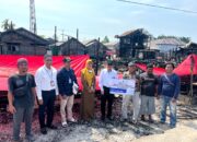 UPZ Bank Kalsel Serahkan Bantuan Uang Tunai di Jalan Setia Pemurus Dalam
