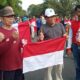 Menyambut HUT RI ke 79, Pemkab Kapuas Bagikan Bendera ke Warga